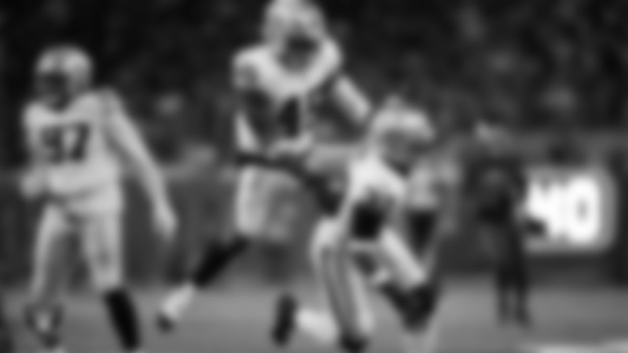 Las Vegas Raiders linebacker Jamal Adams (33) celebrates with linebacker Devin White (45) after making a tackle during the regular season away game against the Houston Texans at NRG Stadium.