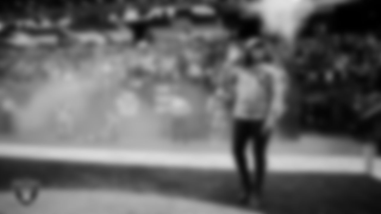 United States Air Force veteran Sherisha Ko is honored during a Salute to Service moment during the regular season home game against the Denver Broncos at Allegiant Stadium.