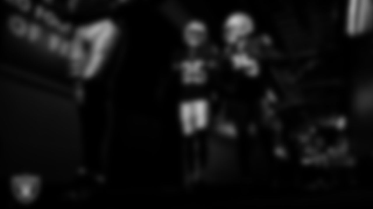 Las Vegas Raiders cornerback Decamerion Richardson (25) and cornerback Chigozie Anusiem (29) walk down the tunnel before the regular season home game against the New York Giants at Allegiant Stadium.