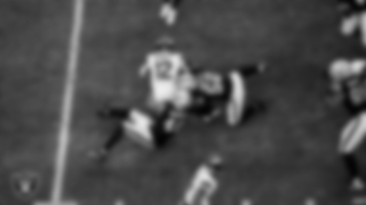 Las Vegas Raiders defensive end Charles Snowden (49) and linebacker Elandon Roberts (52) during the regular season home game against the Denver Broncos at Allegiant Stadium.