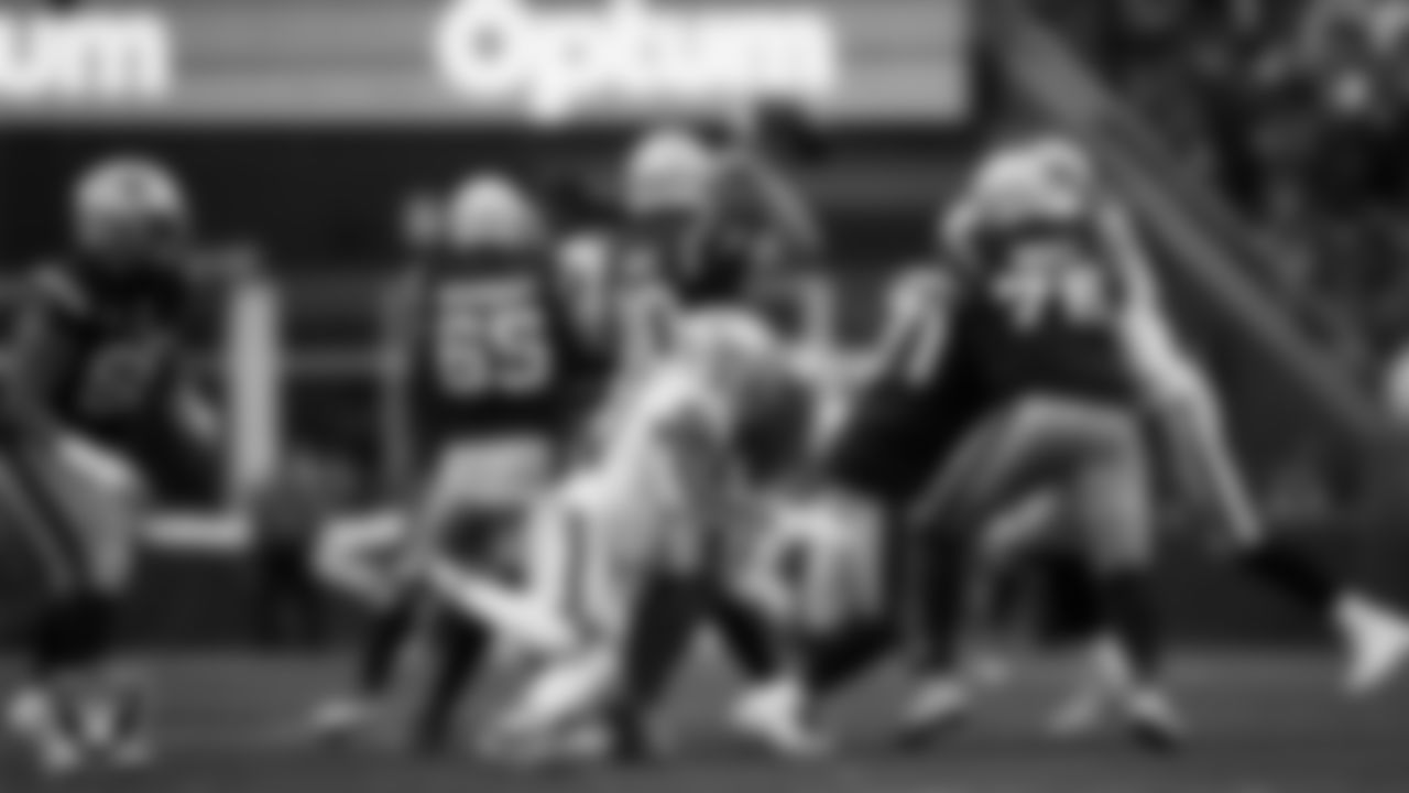 Las Vegas Raiders defensive end Malcolm Koonce (51) forces a fumble during the regular season away game against the New England Patriots at Gillette Stadium.