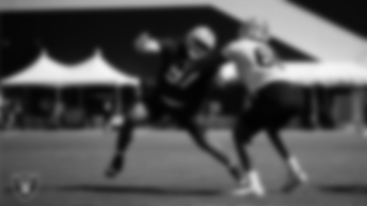 Las Vegas Raiders defensive tackle Tonka Hemingway (97) and tackle Charles Grant (60) on the field for practice at 2025 Training Camp at Intermountain Health Performance Center.