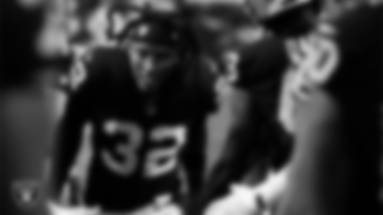 Las Vegas Raiders safety Lonnie Johnson Jr. (32) is introduced onto the field before the regular season home game against the Kansas City Chiefs at Allegiant Stadium.