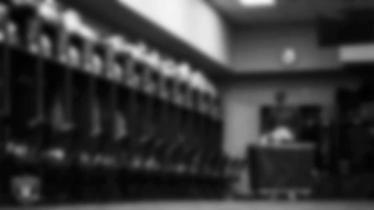 Las Vegas Raiders equipment assistant Aidan Subira in the locker room prior to the Raiders' arrival for their regular season away game against the Indianapolis Colts at Lucas Oil Stadium.