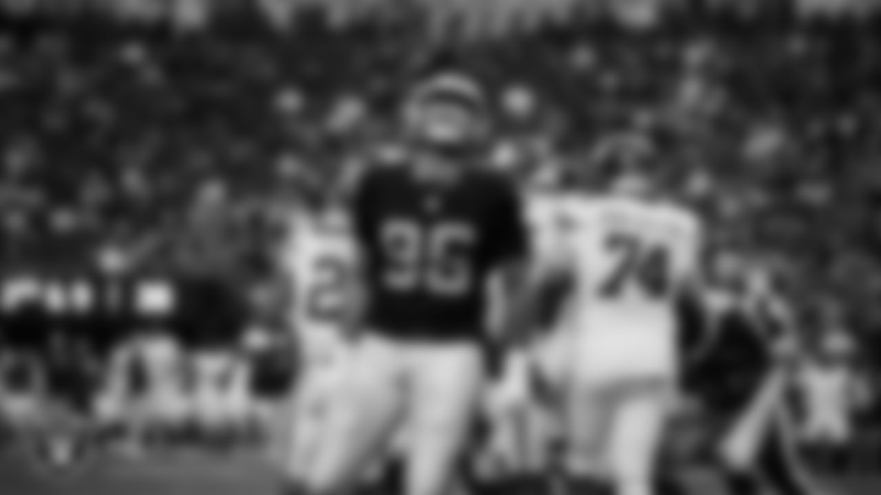 Las Vegas Raiders defensive tackle Jonah Laulu (96) celebrates after making a tackle during the regular season home game against the New York Giants at Allegiant Stadium.