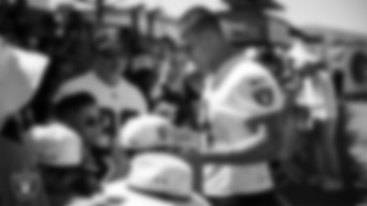 Las Vegas Raiders wide receiver Jack Bech (18) signs autographs after a 2025 Training Camp practice at Intermountain Health Performance Center.