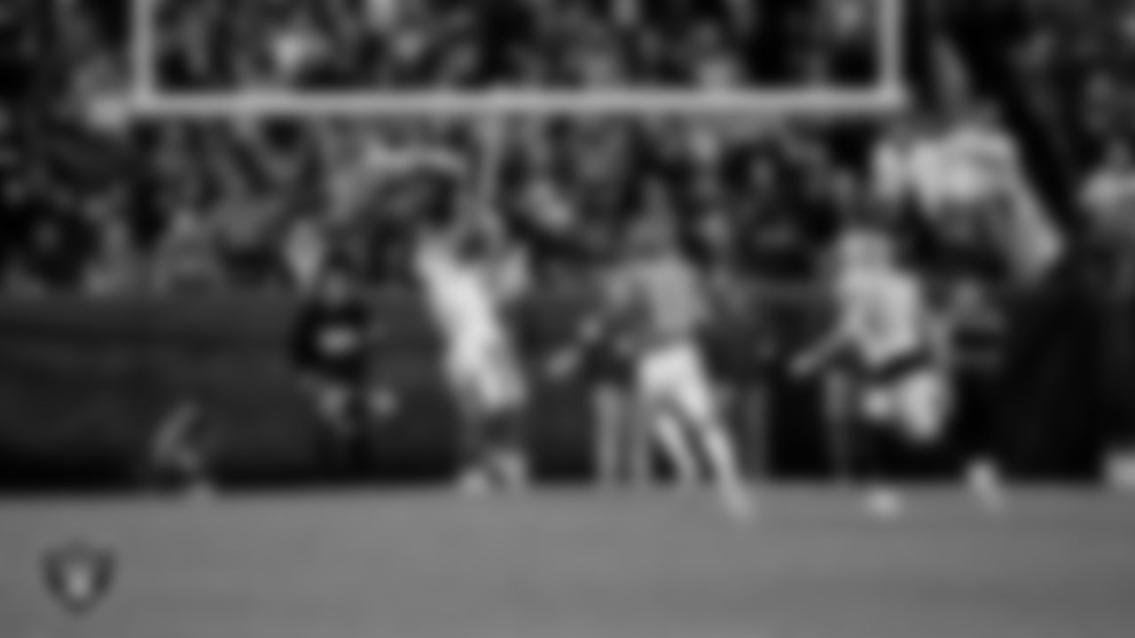 Las Vegas Raiders cornerback Kyu Blu Kelly (36) intercepts a pass during the regular season away game against the Denver Broncos at Empower Field at Mile High.