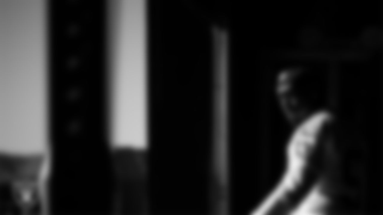 Las Vegas Raiders defensive lineman Boogie Basham (57) walks out to the field for practice at Intermountain Health Performance Center.