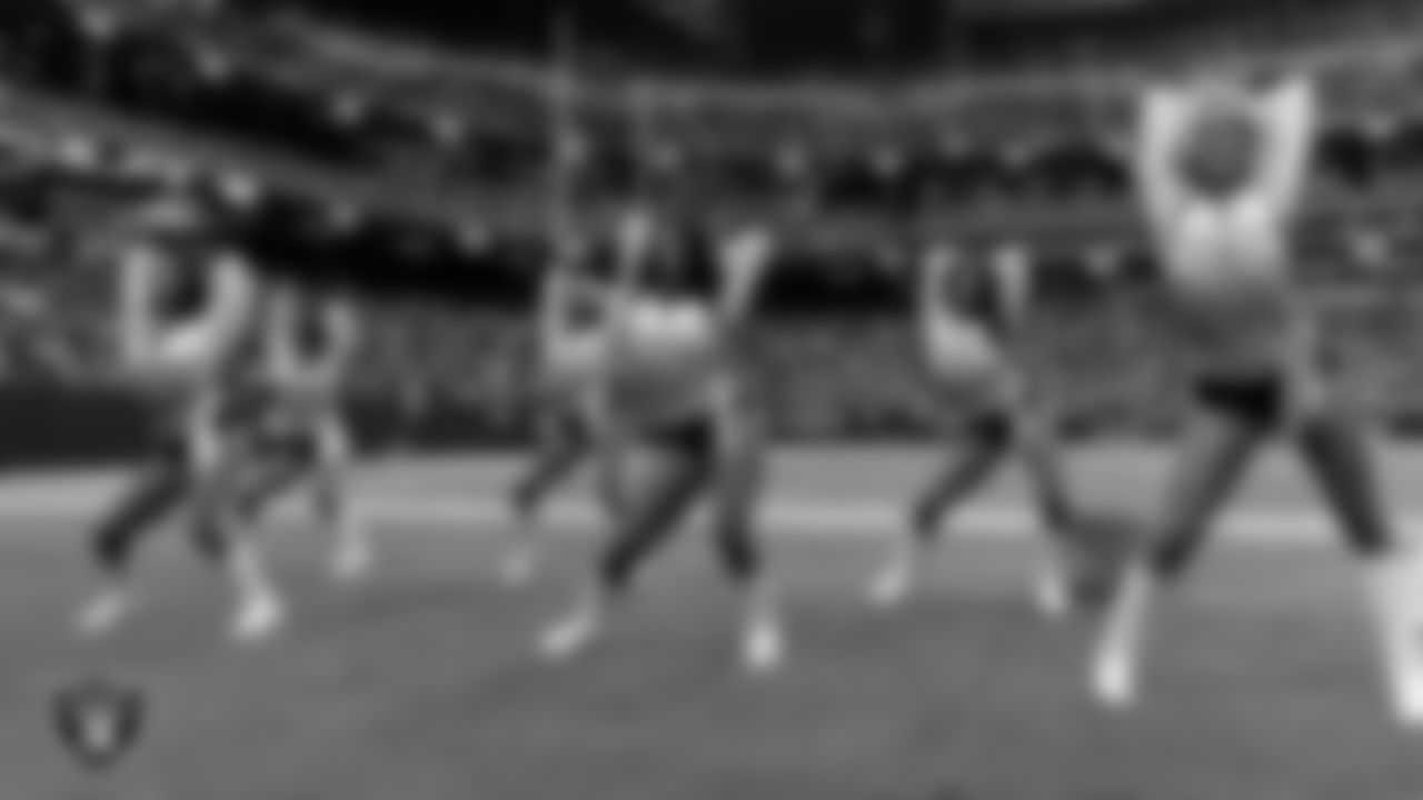 Line 3 of the Raiderettes performs on the sidelines during the preseason home game against the San Francisco 49ers at Allegiant Stadium.
