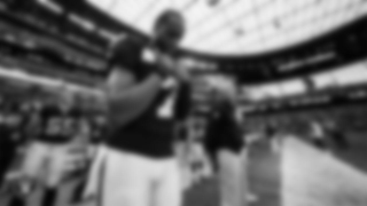 Las Vegas Raiders quarterback Geno Smith (7) during the national anthem before the regular season home game against the Denver Broncos at Allegiant Stadium.