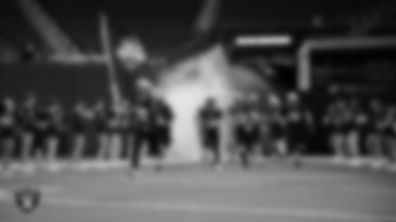 The Faith Lutheran High School football team takes the field before the NIAA 5A Division State Championship game against Spanish Springs High School at Allegiant Stadium.