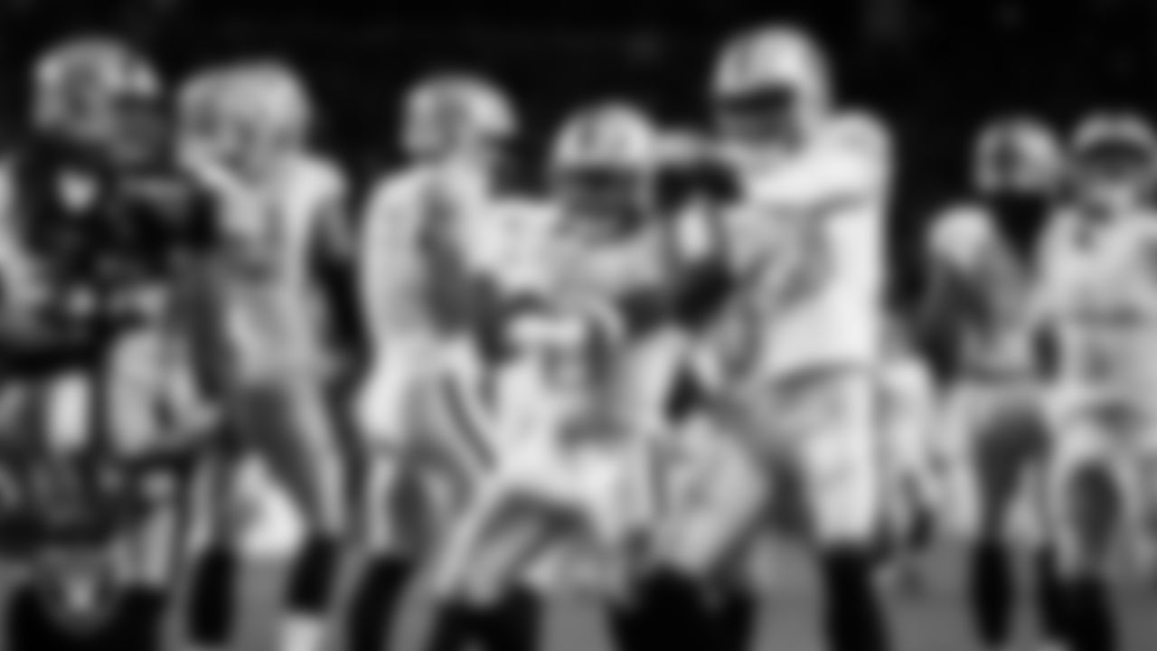 Las Vegas Raiders running back Ashton Jeanty (2) celebrates with wide receiver Dont'e Thornton Jr. (10) after rushing for a 4-yard touchdown during the regular season away game against the Denver Broncos at Empower Field at Mile High.