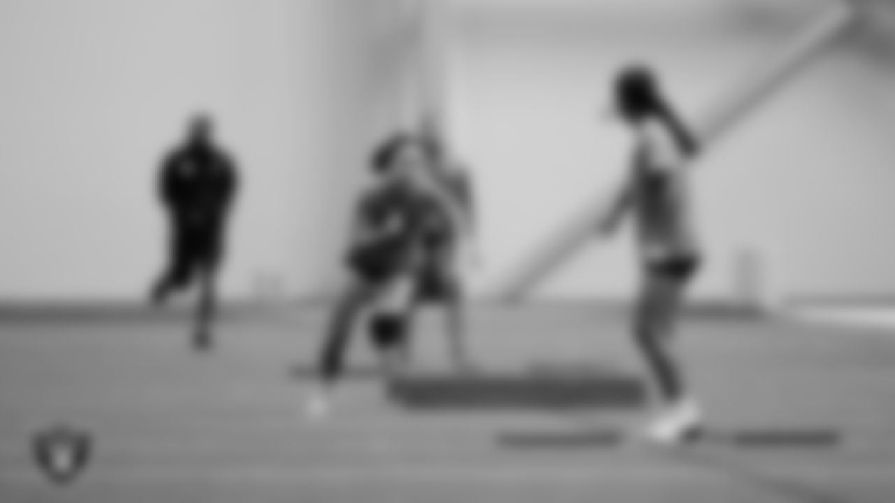 Athletes compete in a relay race during a Nike 11-On event at Intermountain Health Performance Center.