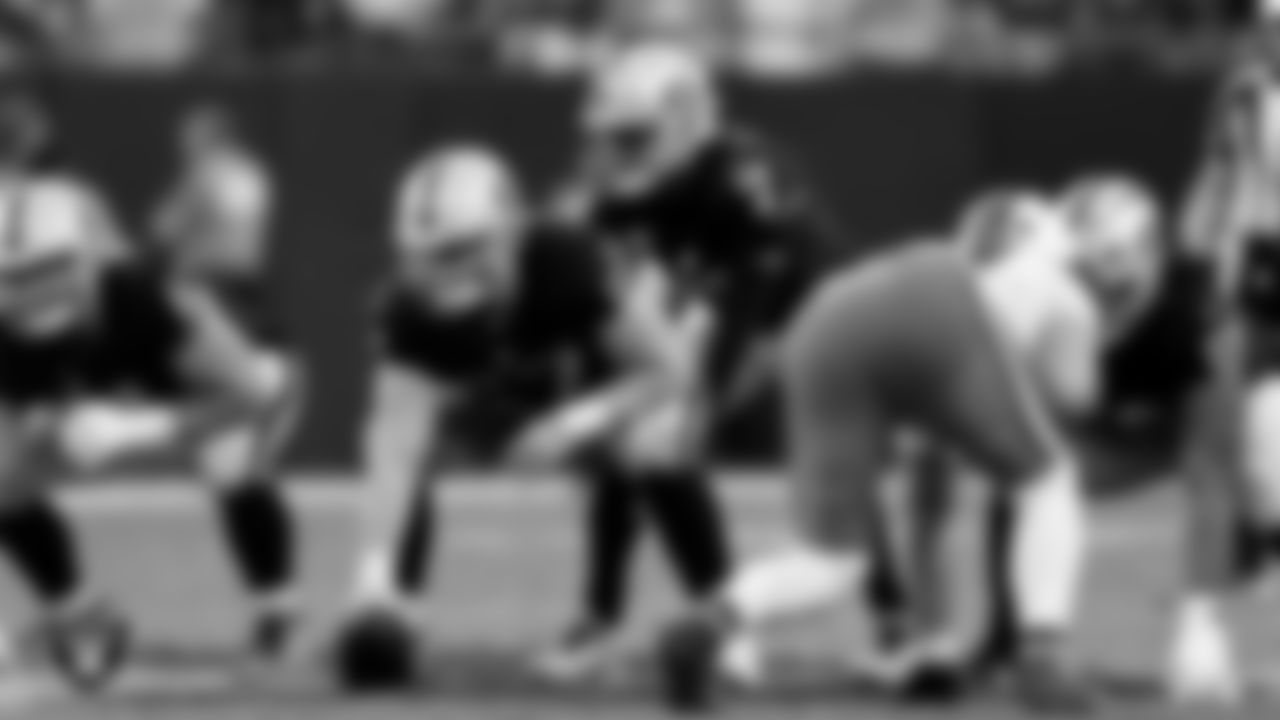 Las Vegas Raiders center Will Putnam (67) and quarterback Geno Smith (7) during the regular season home game against the Cleveland Browns at Allegiant Stadium.