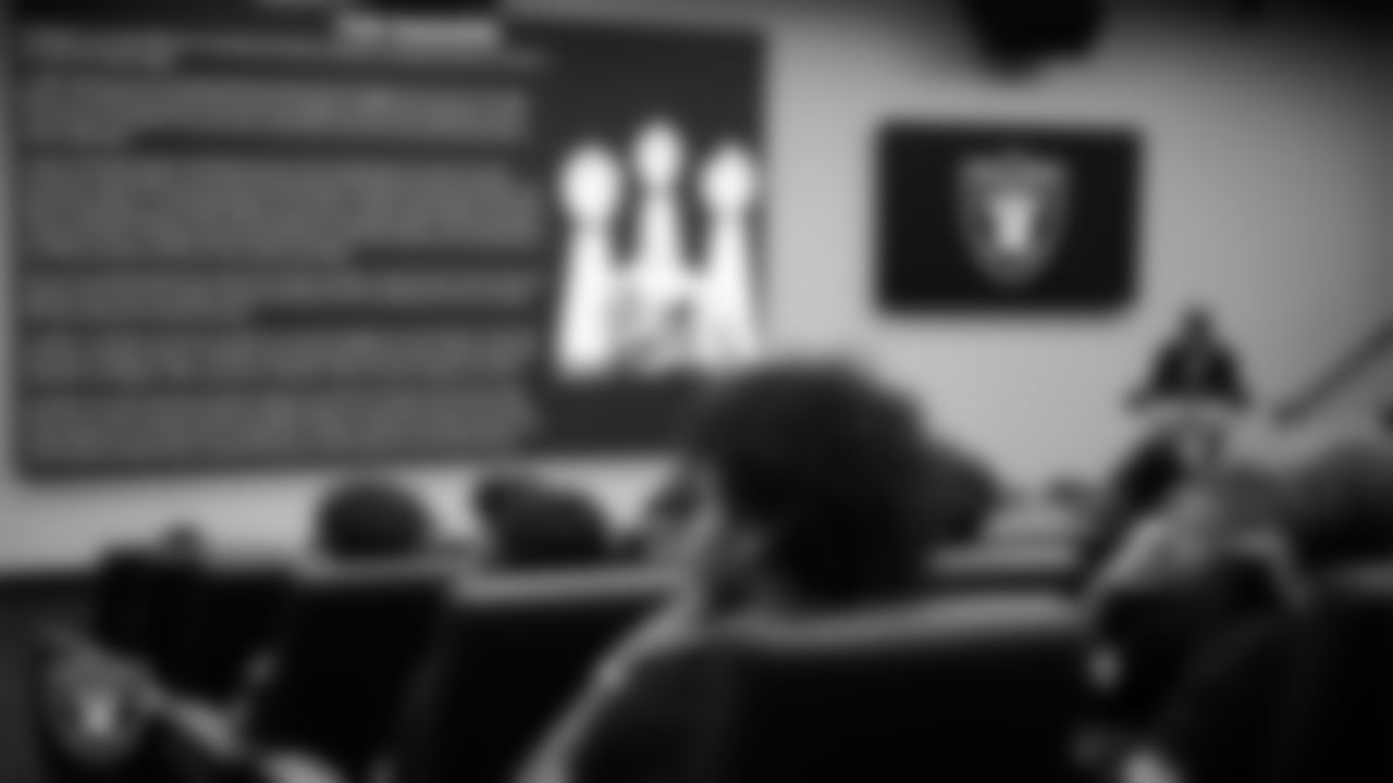 Las Vegas Raiders editor-in-chief of historical content Mike Taylor talks with students about Raiders' history at Intermountain Health Performance Center.