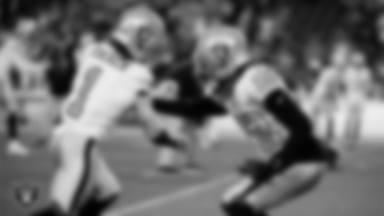 Las Vegas Raiders wide receiver Tre Tucker (1) and cornerback Eric Stokes (22) warming up before the regular season away game against the Denver Broncos at Empower Field at Mile High.