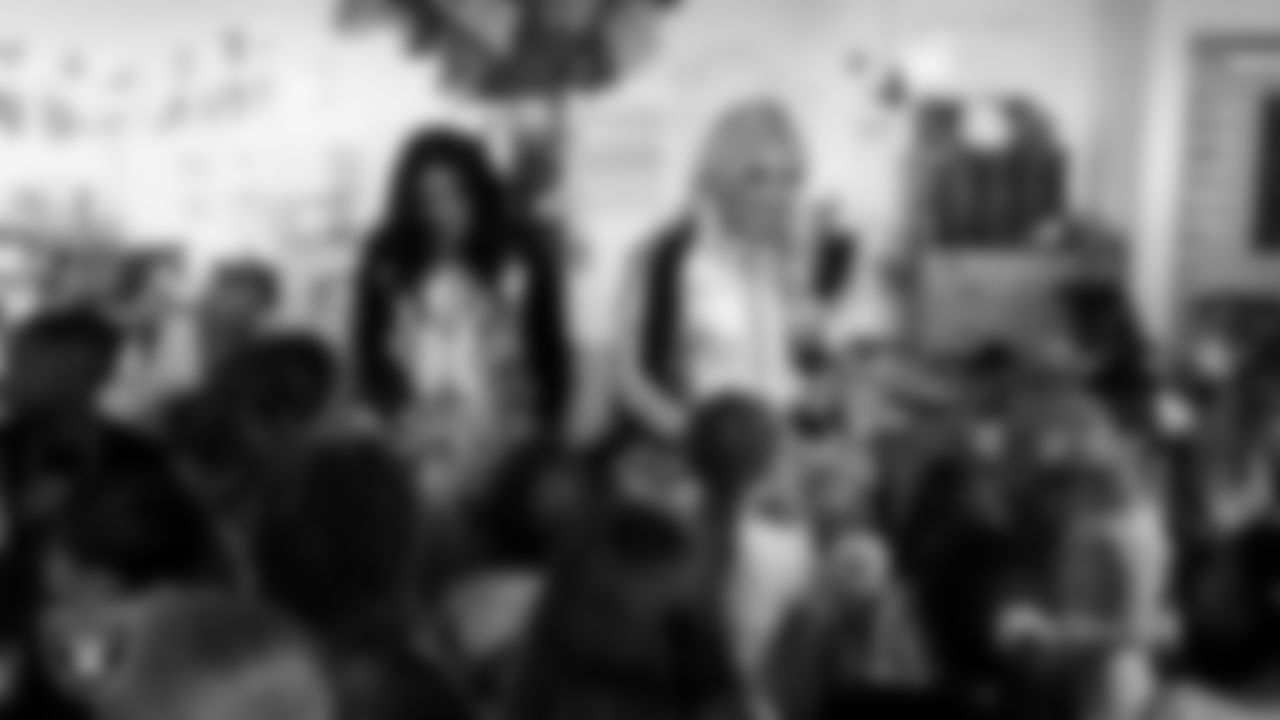 Raiderettes Sloane and Pip speak to students during a 'Lil Raiders Pop-Up at Richard H. Bryan Elementary School.