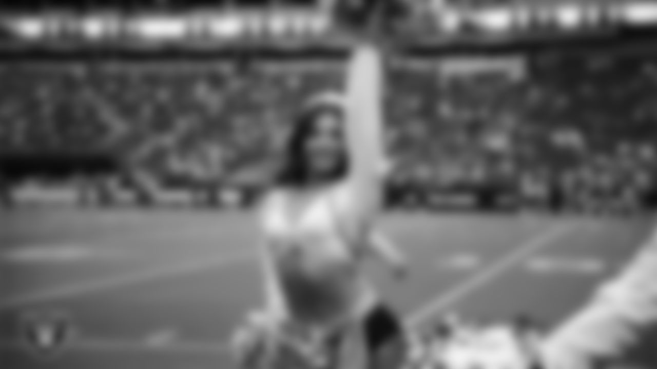 Raiderette Maddie on the sidelines during a 2025 Training Camp mock game at Allegiant Stadium.