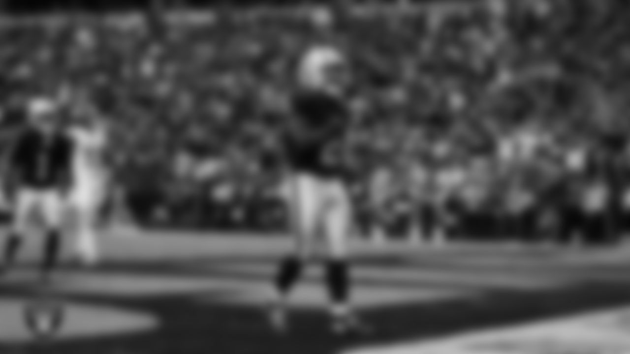 Las Vegas Raiders running back Ashton Jeanty (2) celebrates after rushing for a 3-yard touchdown during the regular season home game against the Tennessee Titans at Allegiant Stadium.