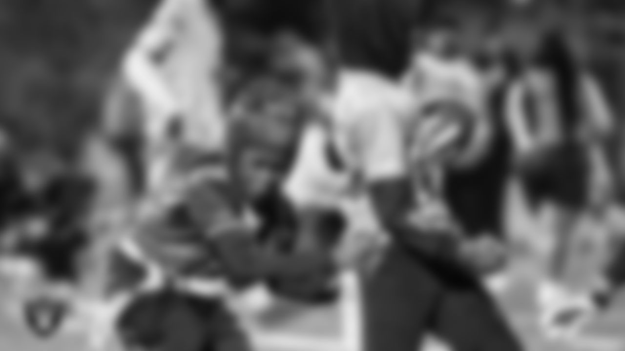 Athletes from the East Division and West Division of the City of Las Vegas Silver and Black Youth Flag Football League compete in the championship game at All American Park.