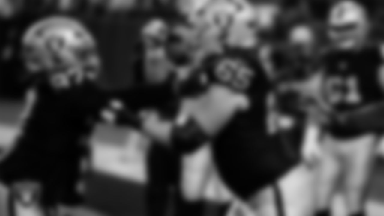 Las Vegas Raiders defensive tackle Tonka Hemingway (97) and guard Alex Cappa (65) warming up before the regular season home game against the Dallas Cowboys at Allegiant Stadium.