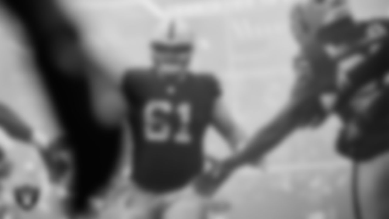 Las Vegas Raiders offensive lineman Jordan Meredith (61) is introduced onto the field before the preseason home game against the San Francisco 49ers at Allegiant Stadium.