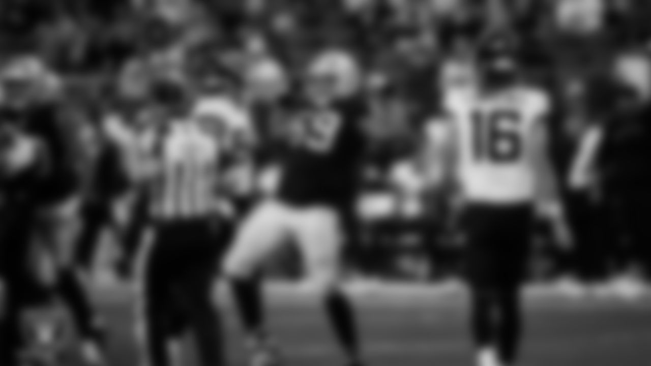 Las Vegas Raiders defensive tackle Adam Butler (69) celebrates after making a tackle during the regular season home game against the Jacksonville Jaguars at Allegiant Stadium.