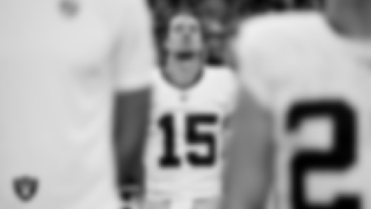 Las Vegas Raiders quarterback Kenny Pickett (15) during the national anthem before the regular season away game against the Indianapolis Colts at Lucas Oil Stadium.