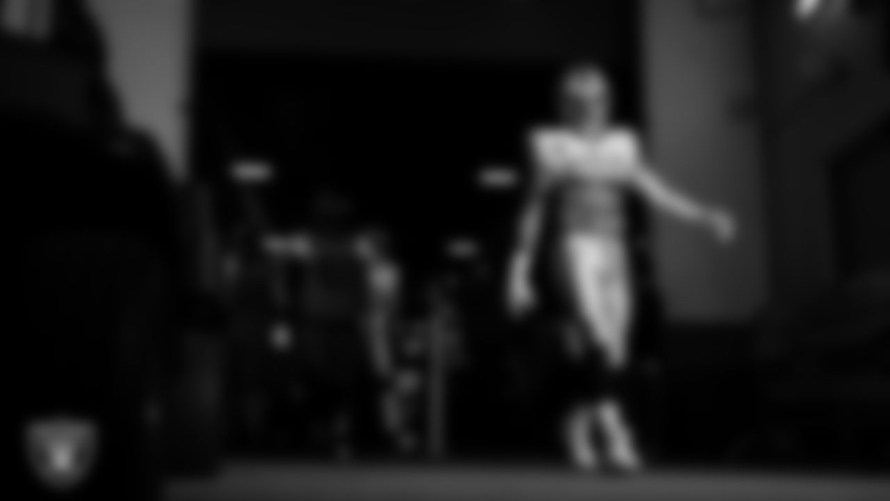 Las Vegas Raiders defensive end Maxx Crosby (98) walks down the tunnel before the regular season away game against the Denver Broncos at Empower Field at Mile High.