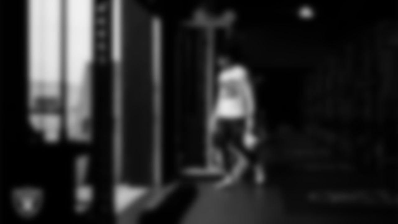 Las Vegas Raiders cornerback Darien Porter (26) walks out to the field for practice at Intermountain Health Performance Center.