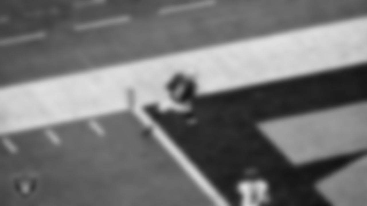 Las Vegas Raiders running back Ashton Jeanty (2) runs after making an 8-yard touchdown catch during the regular season home game against the Chicago Bears at Allegiant Stadium.