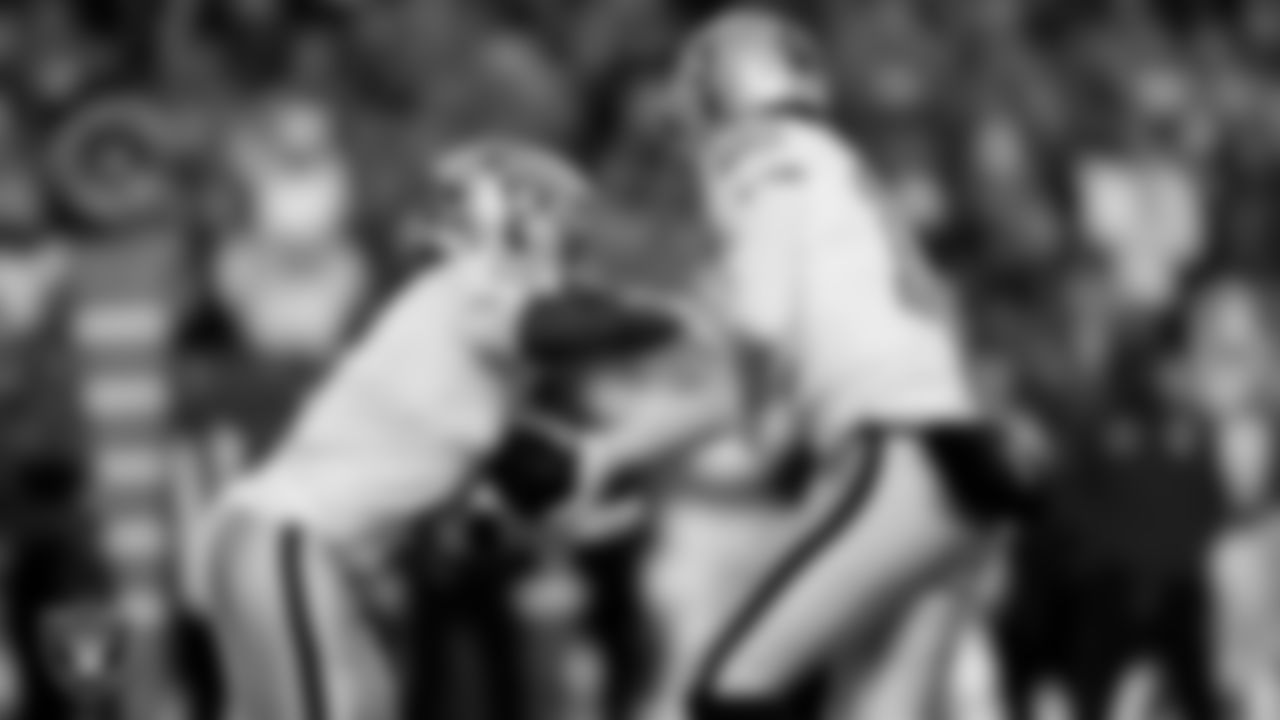 Las Vegas Raiders running back Ashton Jeanty (2) and quarterback Kenny Pickett (15) during the regular season away game against the Denver Broncos at Empower Field at Mile High.