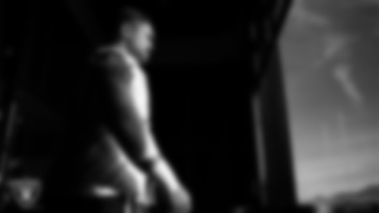 Las Vegas Raiders guard Atonio Mafi (56) walks out to the field for practice at Intermountain Health Performance Center.