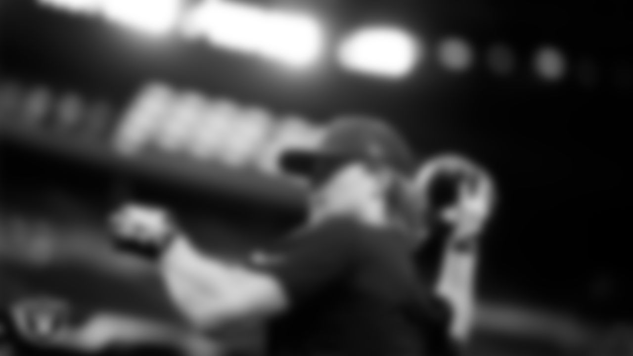 Las Vegas Raiders quarterback Kenny Pickett (15) warming up before the regular season home game against the New York Giants at Allegiant Stadium.