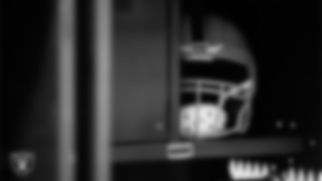 Las Vegas Raiders center Will Putnam's (67) helmet in the locker room prior to the Raiders' arrival for their regular season away game against the Houston Texans at NRG Stadium.