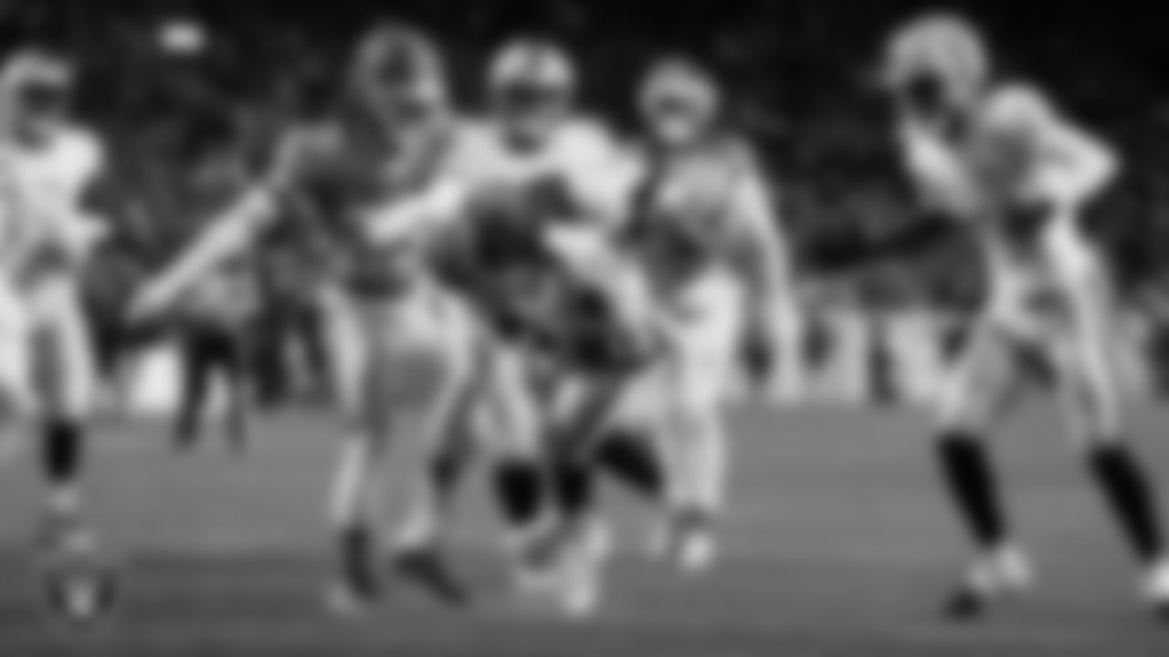 Las Vegas Raiders running back Ashton Jeanty (2) rushes for a 4-yard touchdown during the regular season away game against the Denver Broncos at Empower Field at Mile High.