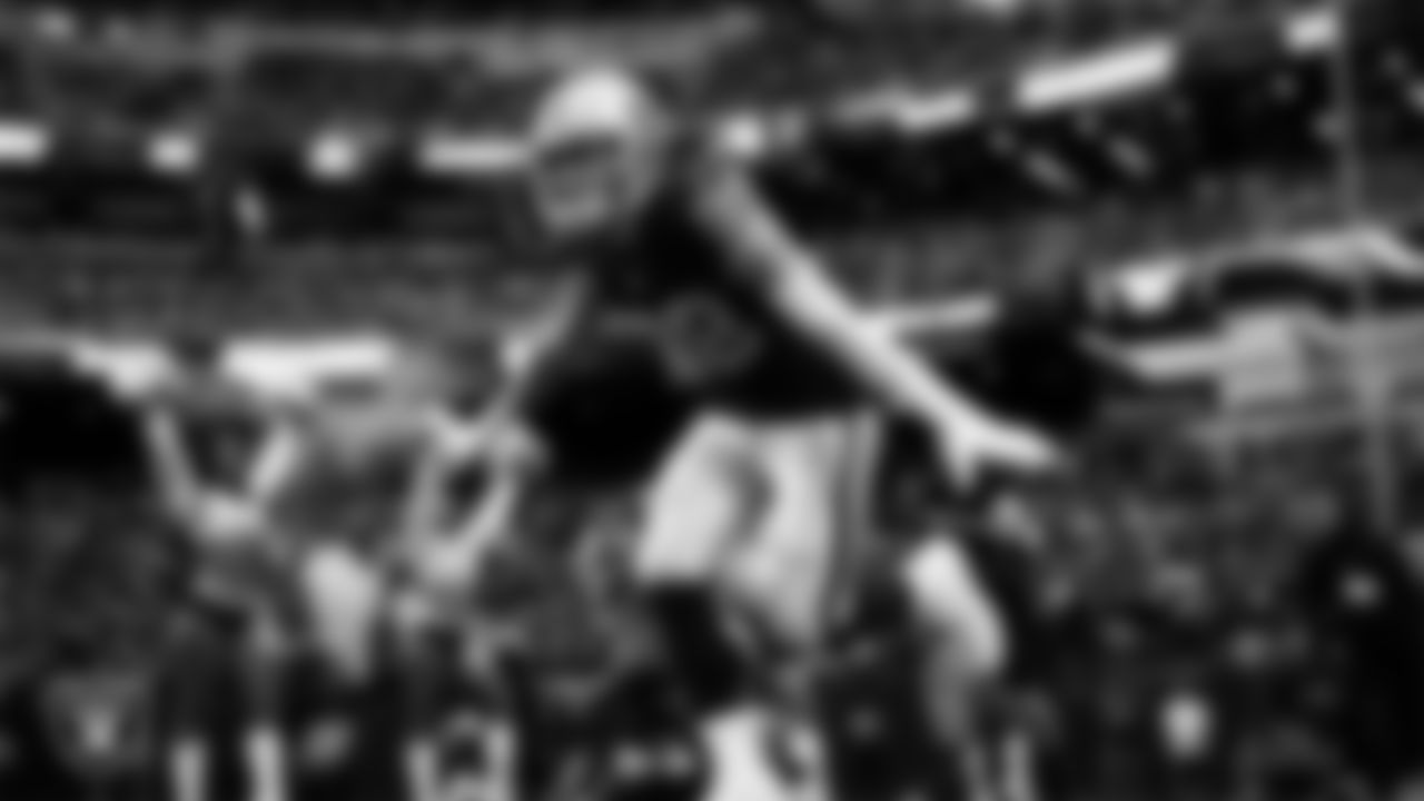 Las Vegas Raiders defensive end Maxx Crosby (98) is introduced onto the field before the regular season home game against the Tennessee Titans at Allegiant Stadium.