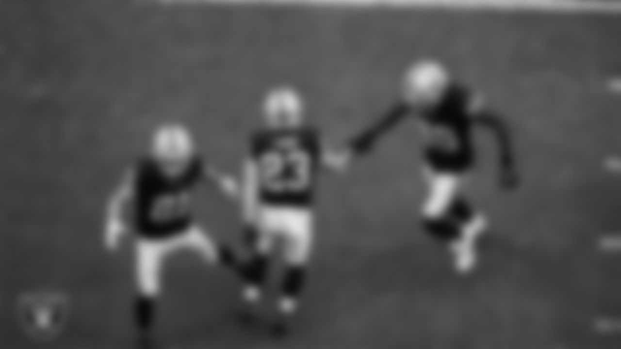 Las Vegas Raiders running back Dylan Laube (23) celebrates with tight end Justin Shorter (88) after making a tackle during the preseason home game against the San Francisco 49ers at Allegiant Stadium.
