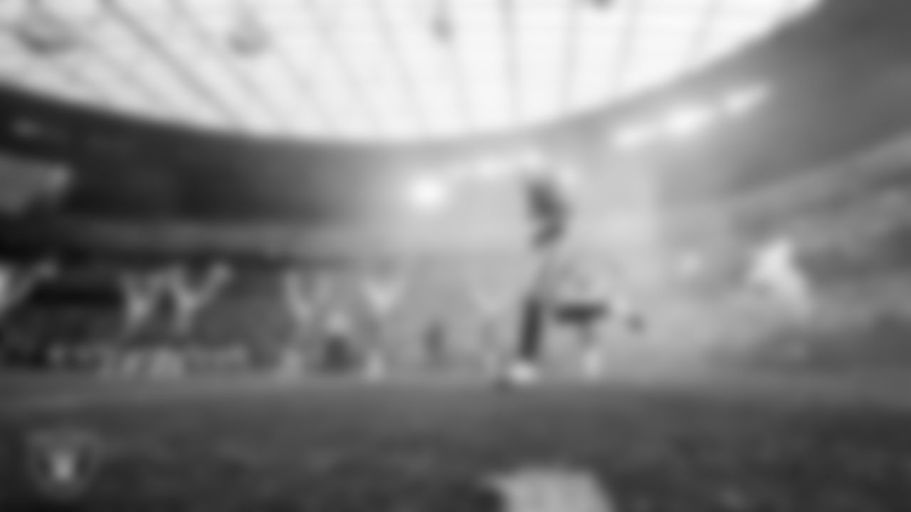 Las Vegas Raiders safety Isaiah Pola-Mao (20) is introduced onto the field before the regular season home game against the Denver Broncos at Allegiant Stadium.