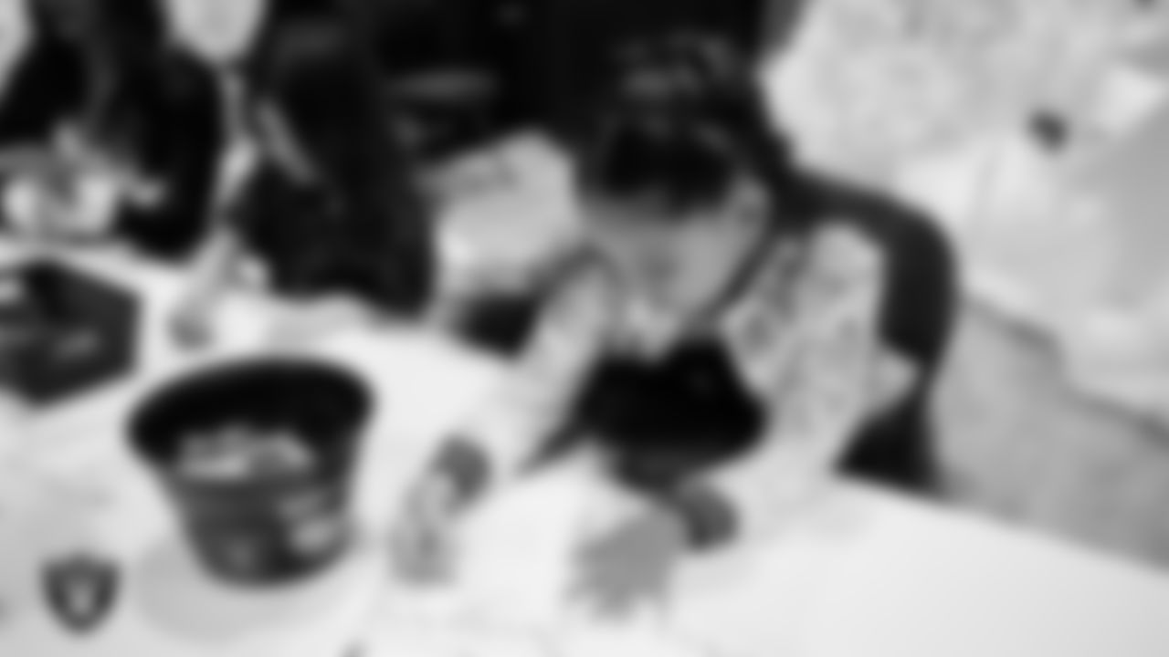 A Junior Raiderette enjoys activities during the Junior Raiderettes Banquet at The Studio.