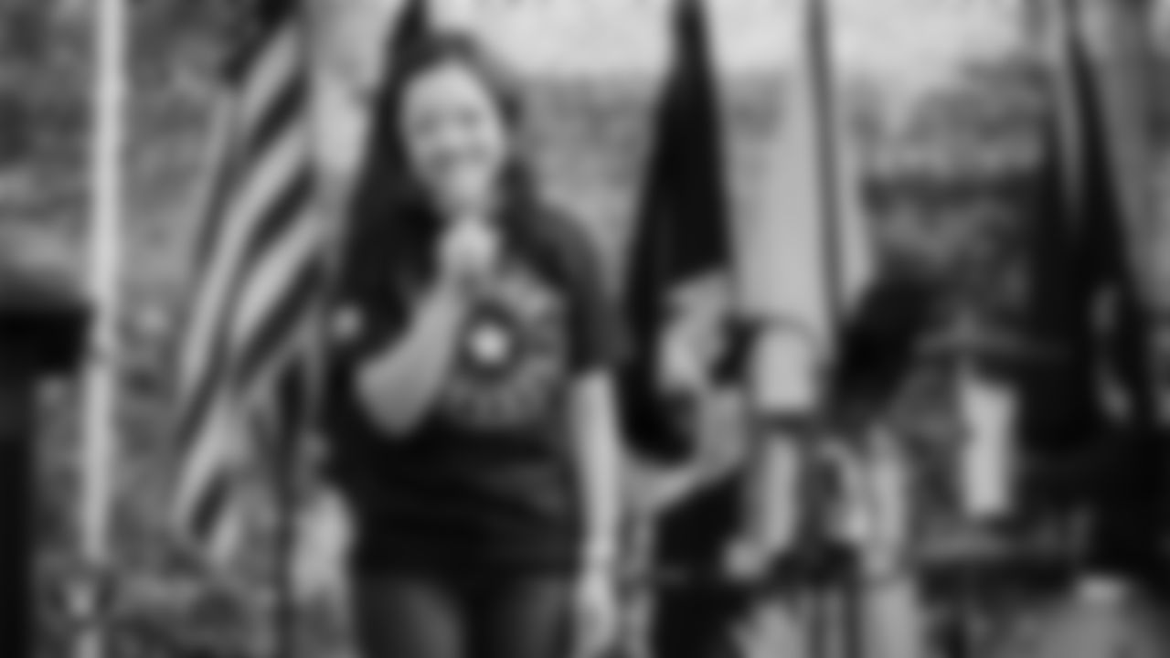 U.S. VETS national director of executive leadership Shalimar Cabrera speaks during the Veterans Tailgate in Downtown Las Vegas.