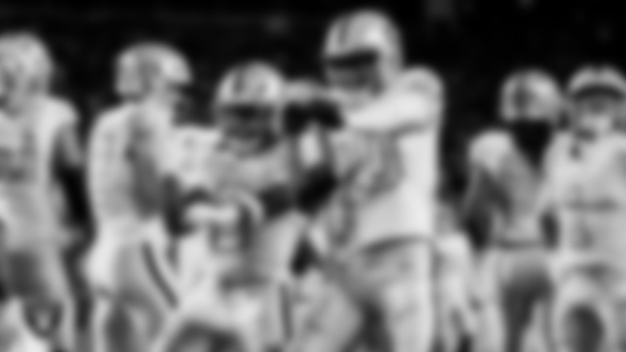 Las Vegas Raiders running back Ashton Jeanty (2) celebrates with wide receiver Dont'e Thornton Jr. (10) after rushing for a 4-yard touchdown during the regular season away game against the Denver Broncos at Empower Field at Mile High.