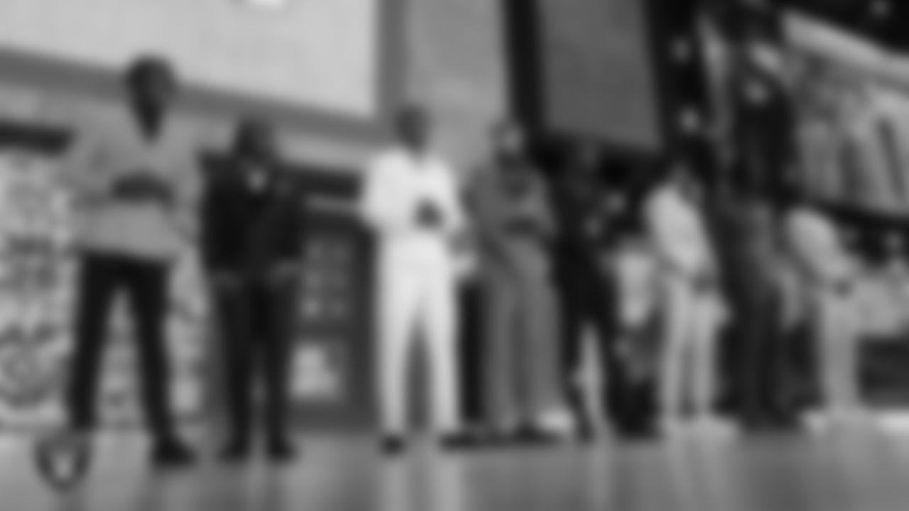 Draft prospects stand on stage before the first round of the 2025 NFL Draft.
