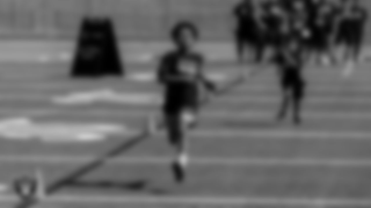 An athlete participates in a drill during the Play Football Youth Combine at Silverado High School.
