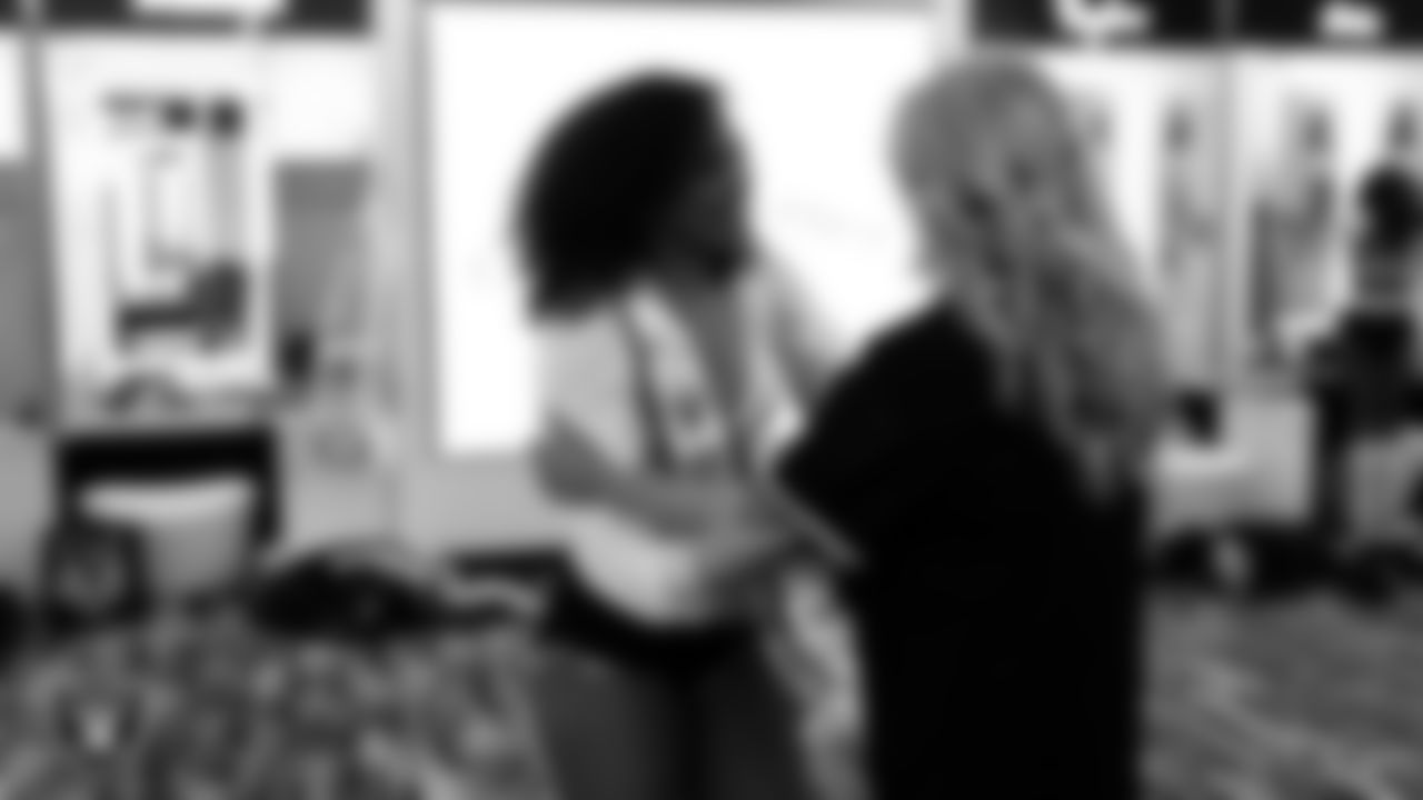 Raiderette Makenna is named Raiderette of the Game in the locker room before the regular season home game against the Cleveland Browns at Allegiant Stadium.