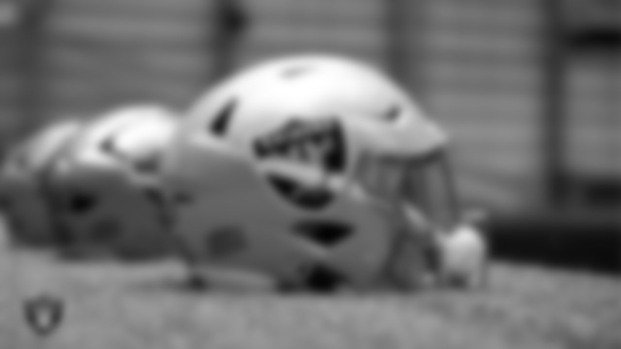 A helmet on the indoor field at an Organized Team Activity (OTA) at Intermountain Health Performance Center.