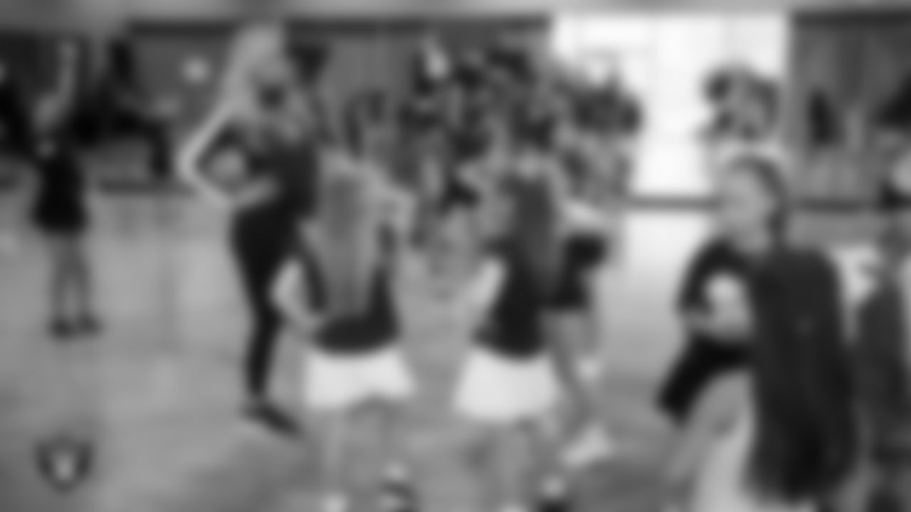 Raiderette Delaney with dancers during day one of summer camp at The Studio.