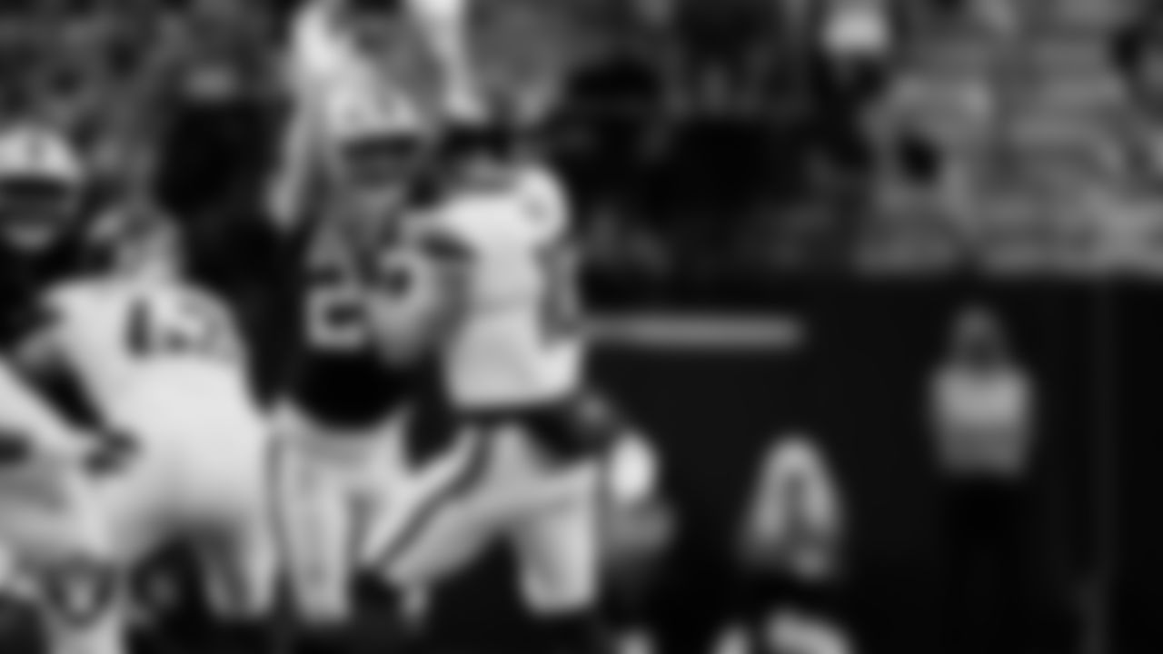 Las Vegas Raiders safety Isaiah Pola-Mao (20) pressures the quarterback during the regular season home game against the Denver Broncos at Allegiant Stadium.