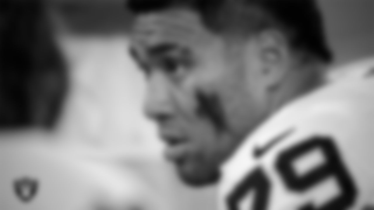 Las Vegas Raiders offensive lineman Laki Tasi (79) on the sidelines during the preseason away game against the Arizona Cardinals at State Farm Stadium.
