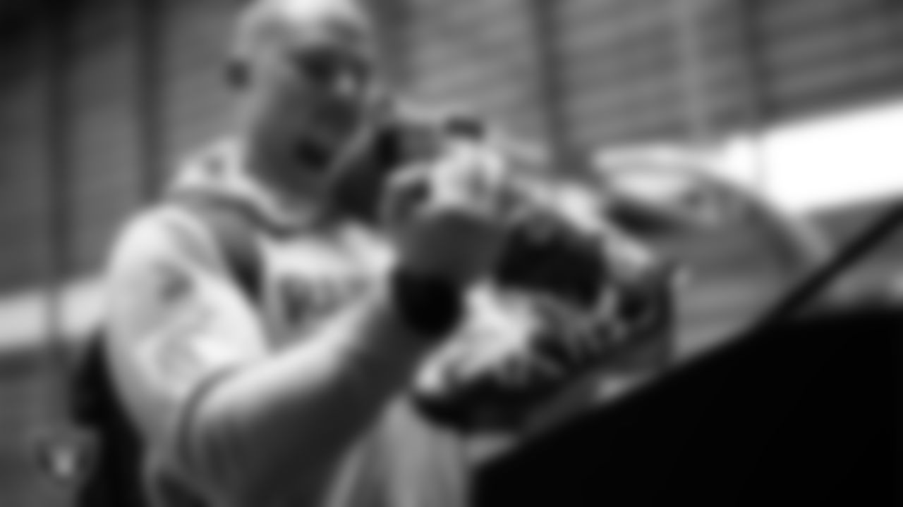Las Vegas Raiders long snapper Jacob Bobenmoyer (50) unboxes his custom cleats for the NFL's My Cause My Cleats initiative at Intermountain Health Performance Center.